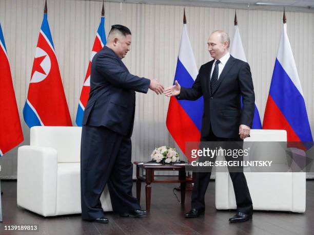 Russian President Vladimir Putin meets with North Korean leader Kim Jong Un at the Far Eastern Federal University campus on Russky island in the...