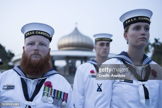Members of the Royal Australian Navy attend the ANZAC Day Dawn Service in commemoration of the 104th anniversary of the ANZAC landing at Gallipoli,...