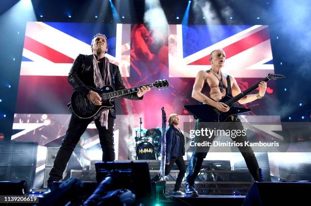 Inductees Vivian Campbell , Joe Elliott and Phil Collen of Def Leppard perform at the 2019 Rock & Roll Hall Of Fame Induction Ceremony - Show at...