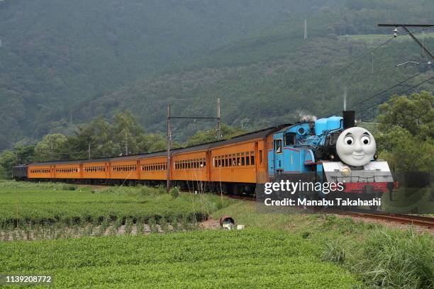 Steam Locomotive of the ‘Thomas The Tank Engine’ runs between Nukuri and Ieyama stations on August 3, 2018 in Shimada, Shizuoka, Japan.