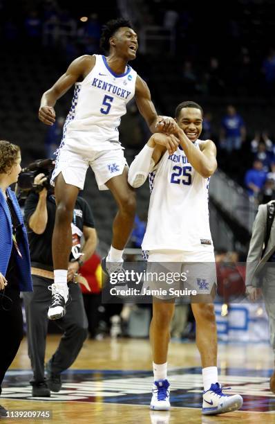 Immanuel Quickley of the Kentucky Wildcats celebrates with PJ Washington after defeating the Houston Cougars 62-58 during the 2019 NCAA Basketball...