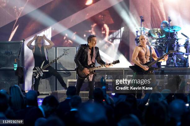 Inductees Rick Savage, Rick Allen, and Phil Collen of Def Leppard perform at the 2019 Rock & Roll Hall Of Fame Induction Ceremony - Show at Barclays...