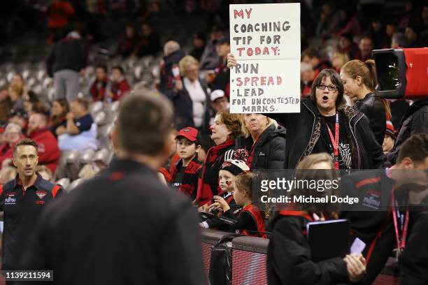 Bombers fans message to the Bombers head coach John Worsfold is seen by him as he walks past during the round two AFL match between the Essendon...