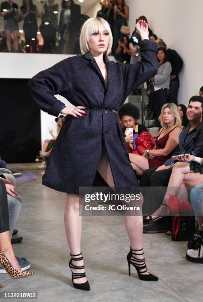 Model walks the runway at the Matt Sarafa and Jonathan Marc Stein's new 'Rich' clothing line release and fashion show on March 29, 2019 in Los...