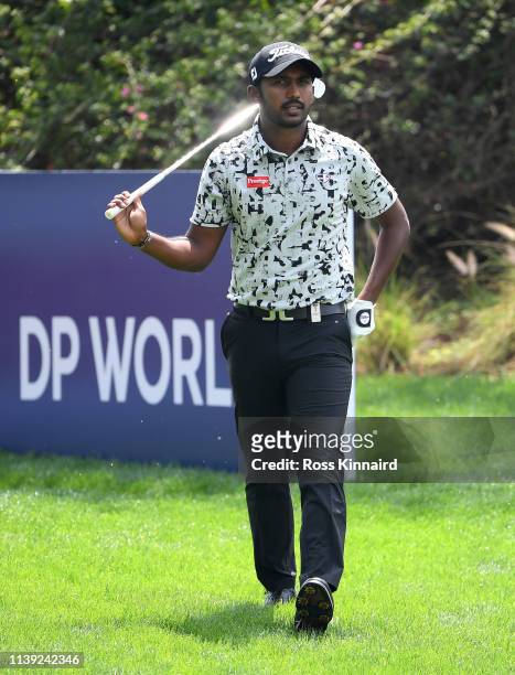 Chikkarangappa of India on the reacts after his shot on the 17th tee during the third round of the Hero Indian Open at the DLF Golf & Country Club on...