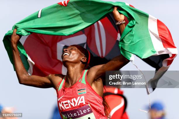 Hellen Obiri of Kenya celebrates winning the Women's Senior Final during the IAAF World Athletics Cross Country Championships on March 30, 2019 in...