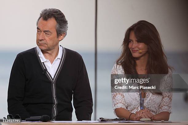 Presenter Michel Denisot and TV journalist Charlotte Le Bon attend the 'Le Grand Journal' daily show rehearsal on May 10, 2011 in Cannes, France.