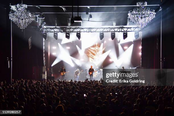Sadler Vaden, Jimbo Hart, Jason Isbell, Chad Gamble and Derry deBorja of Jason Isbell and The 400 Unit perform at The Fillmore New Orleans on March...