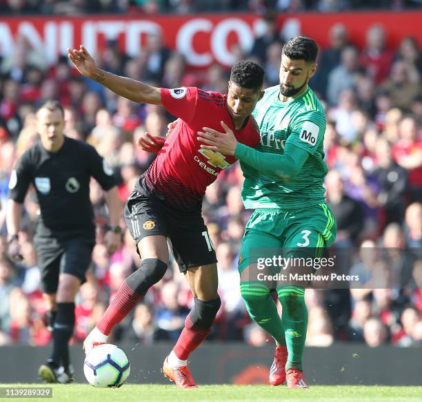 Marcus Rashford of Manchester United in action with Miguel Britos of Watford during the Premier League match between Manchester United and Watford FC...