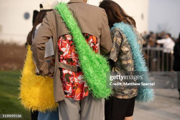 Guests are seen on the street attending Labelhood during Shanghai Fashion Week A/W 2019/2020 wearing colorful faux fur bags on March 30, 2019 in...