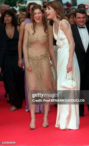 Cannes international film festival: stairs of closing ceremony In Cannes, France On May 21, 2000-Milla Jovovitch and Laetitia Casta.