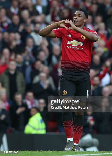 Anthony Martial of Manchester Unitedcelebrates scoring their second goal during the Premier League match between Manchester United and Watford FC at...