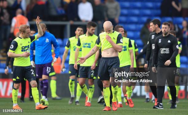 Huddersfield Town look dejected following the Premier League match between Crystal Palace and Huddersfield Town at Selhurst Park on March 30, 2019 in...