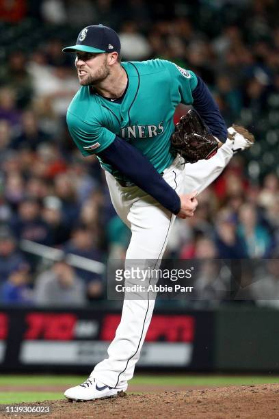 Hunter Strickland of the Seattle Mariners pitches against the Boston Red Sox in the ninth inning during their game at T-Mobile Park on March 29, 2019...