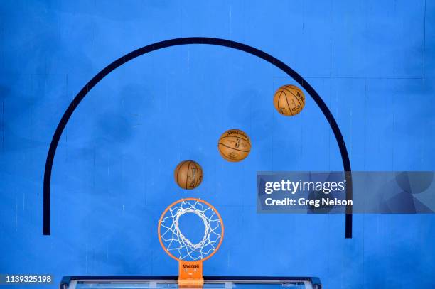 Playoffs: Aerial view of basket with basketballs going through net before Oklahoma City Thunder vs Portland Trail Blazers game at Chesapeake Energy...