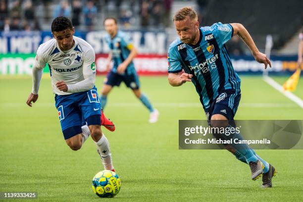 Nicklas Barkroth of Djurgardens IF in a duel with Ian Smith of IFK Norrkoping during the Allsvenskan match between Djurgardens IF and IFK Norrkoping...