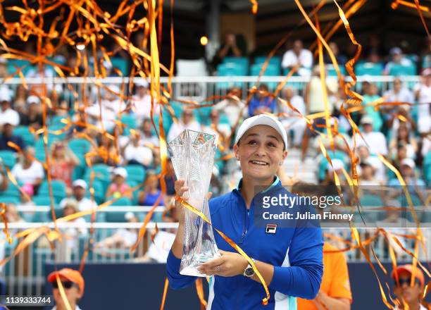 Ashleigh Barty of Australia celebrates with the trophy after her win against Karolina Pliskova of Czech Republic in the final during day thirteen of...