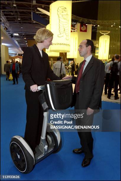 French president Jacques Chirac at the 2002 Paris auto show in Paris, France On September 27, 2002-The Segway, human transporter and Edouard Michelin.