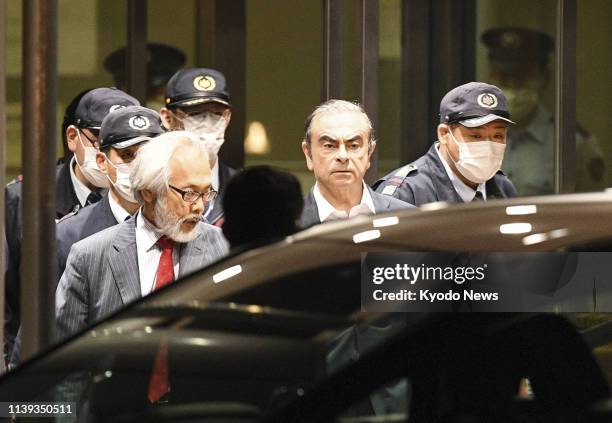 Former Nissan Motor Co. Chairman Carlos Ghosn, who has been indicted in Japan for alleged financial misconduct, is released from the Tokyo Detention...