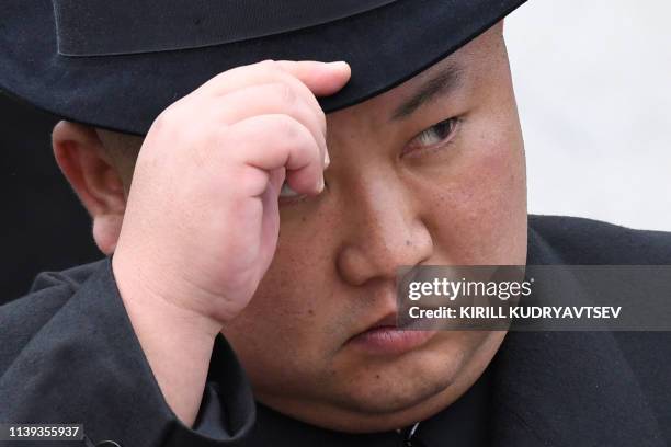 North Korean leader Kim Jong Un attends a wreath-laying ceremony at a WWII memorial in the far-eastern Russian port of Vladivostok on April 26, 2019.