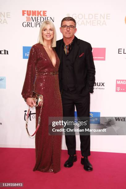 Hans Sigl and partner Susanne attend the Goldene Kamera at Tempelhof Airport on March 30, 2019 in Berlin, Germany.