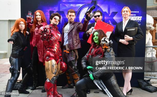 Fans of the Avengers arrive for a costume contest before the first screening of "Avengers: Endgame" at the TCL Chinese Theater in Hollywood,...