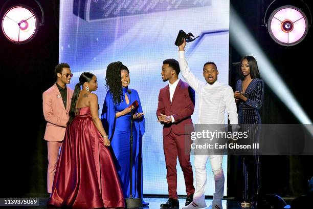 Todd Dulaney accepts the "Praise and Worship CD of the Year" award from Jelani Winston, Katlyn Nichol and Christopher Jefferson during the 34th...