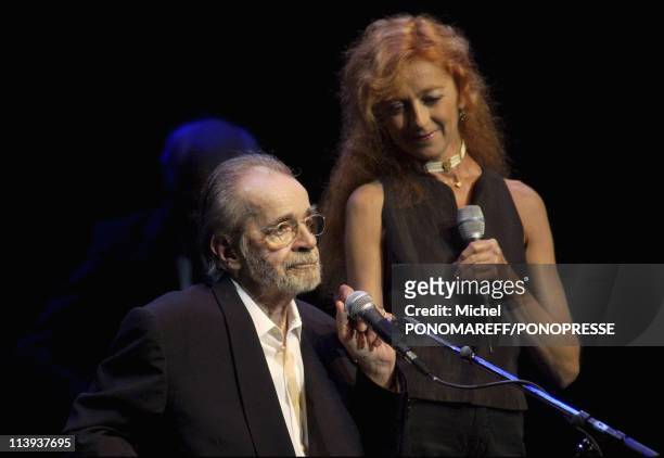 Serge Reggiani and his daughter Carine perform at the Francofolies of Montreal In Montreal, Canada On August 01, 2003.