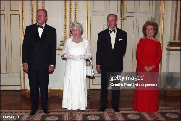 State diner in honor of Queen Elizabeth In Paris, France On April 05, 2004 -Queen Elizabeth II and Duke of Edinburgh accompanied by French President...