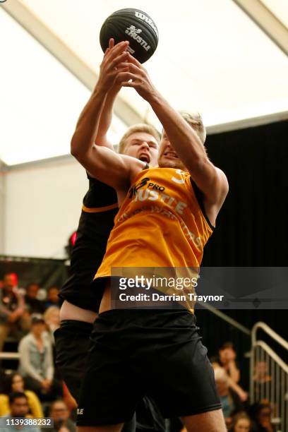 Cooper Wilks of Sydney Warriors drives to the basket as Harry Frolling of Stateside Sports defends during 3 x 3 Pro Hustle on March 31, 2019 in...