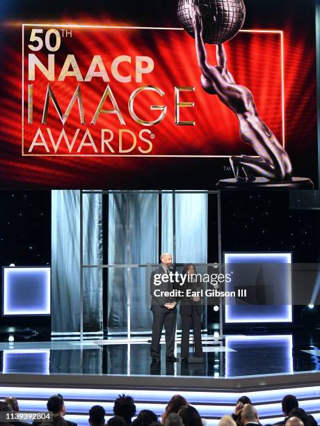 Cory Booker and Kamala Harris speak onstage at the 50th NAACP Image Awards at Dolby Theatre on March 30, 2019 in Hollywood, California.