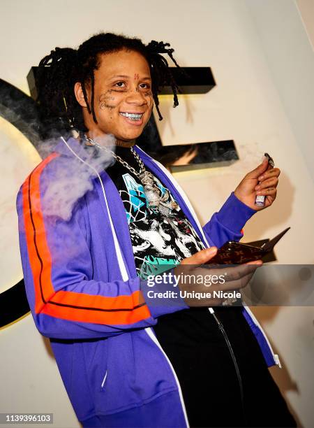 Trippie Redd performs for fans at Launch Event of Rapper Trippie Redd's Clothing Line With DOPE at DOPE on March 30, 2019 in Los Angeles, California.