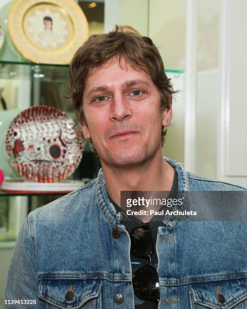 Singer Rob Thomas attends Brandon Boyd's signing of his new memory game "Deus Portes" and his book "So The Echo" at Ron Robinson Fred Segal on March...