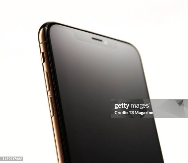 Detail of an Apple iPhone XS Max smartphone with a Gold finish, taken on September 25, 2018.