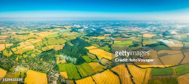 aerial panorama over crop fields farms green pasture summer landscape - midlands england stock pictures, royalty-free photos & images