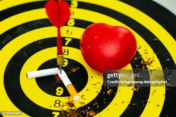 quit smoking keeps your heart healthy. - smoke heart stock pictures, royalty-free photos & images