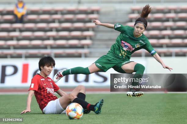 Kana Osafune of Urawa Red Diamonds Ladies and Yui Hasegawa NTV Beleza compete for the ball the Nadeshiko League match between Urawa Red Diamonds...