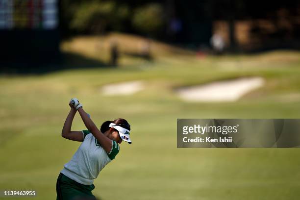 Rei Matsuda of Japan hits her second shot on the 17th hole during the final round of the AXA Ladies Golf Tournament at the UMK Country Club on March...