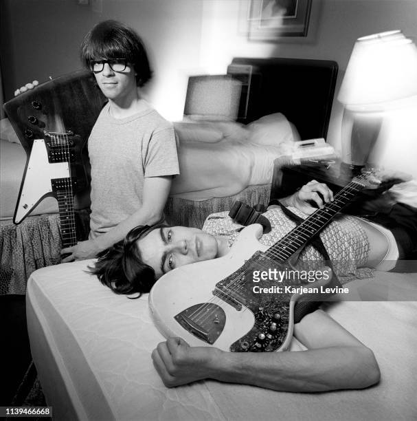 Rivers Cuomo and Brian Bell relax at their hotel before a Weezer show on August 26, 1994 in New York City, New York.