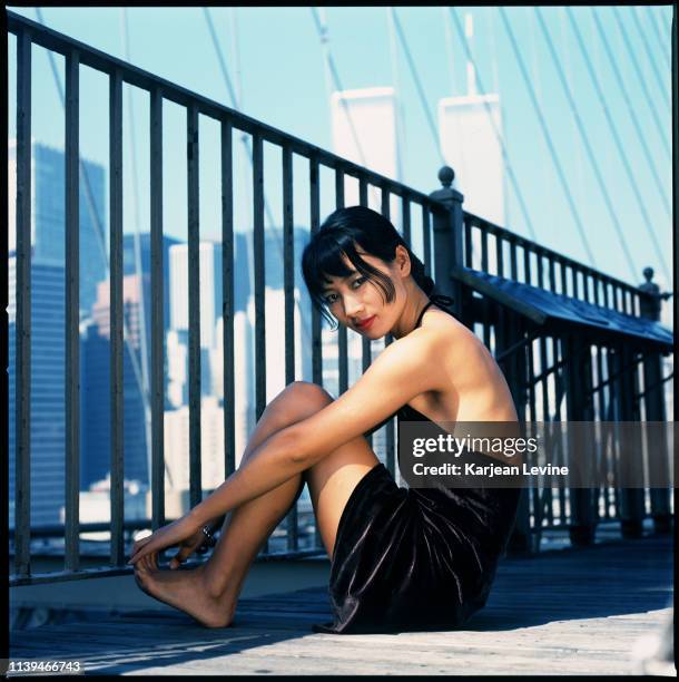 Actress Bai Ling poses for a portrait in front of the city skyline on October 2, 1995 in New York City, New York.