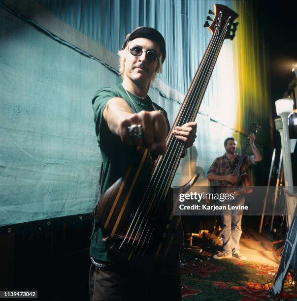 Musicians Les Claypool and Mike Watt meet for a joint portrait backstage on August 4, 1995 in New York City, New York.