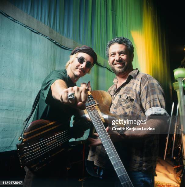 Musicians Les Claypool and Mike Watt meet for a joint portrait backstage on August 4, 1995 in New York City, New York.