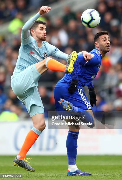 Victor Camarasa of Cardiff City collides with Jorginho of Chelsea during the Premier League match between Cardiff City and Chelsea FC at Cardiff City...