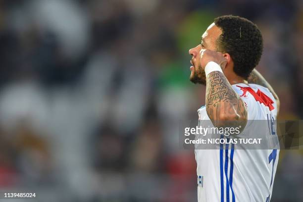 Lyon's Dutch forward Memphis Depay celebrates after scoring a goal during the French L1 football match between Bordeaux and Lyon on April 26, 2019 at...