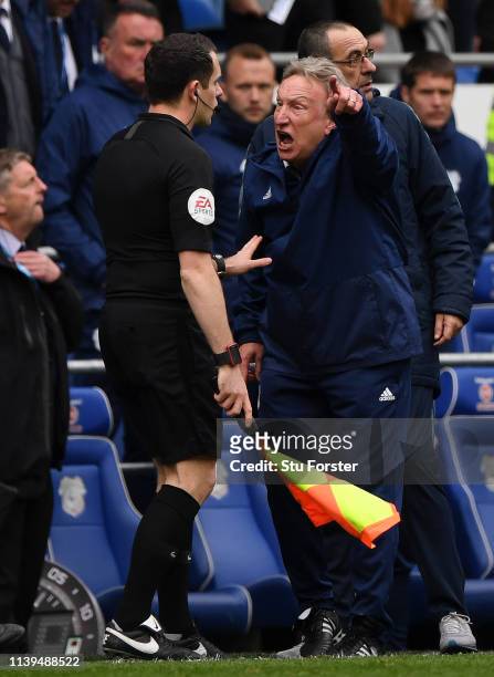 Neil Warnock, Manager of Cardiff City argues with the fourth official during the Premier League match between Cardiff City and Chelsea FC at Cardiff...