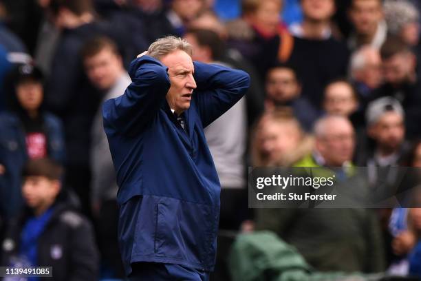 Neil Warnock, Manager of Cardiff City reacts at the full time whistle after the Premier League match between Cardiff City and Chelsea FC at Cardiff...