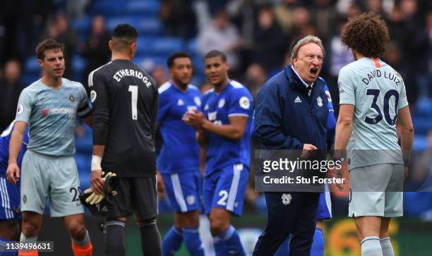 Cardiff manager Neil Warnock has words with Chelsea player David Luiz after the Premier League match between Cardiff City and Chelsea FC at Cardiff...