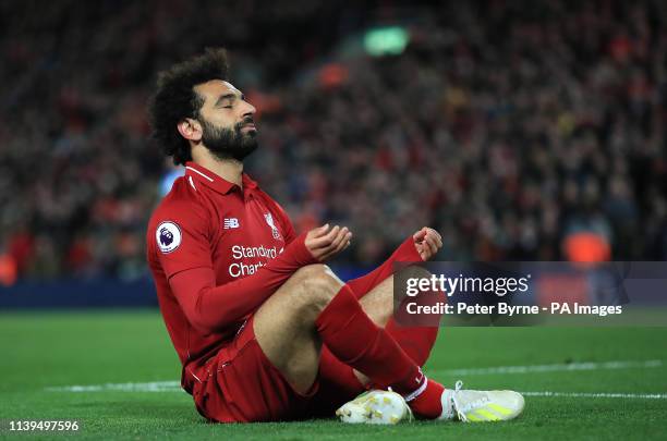 Liverpool's Mohamed Salah celebrates scoring his side's fifth goal of the game during the Premier League match at Anfield, Liverpool.