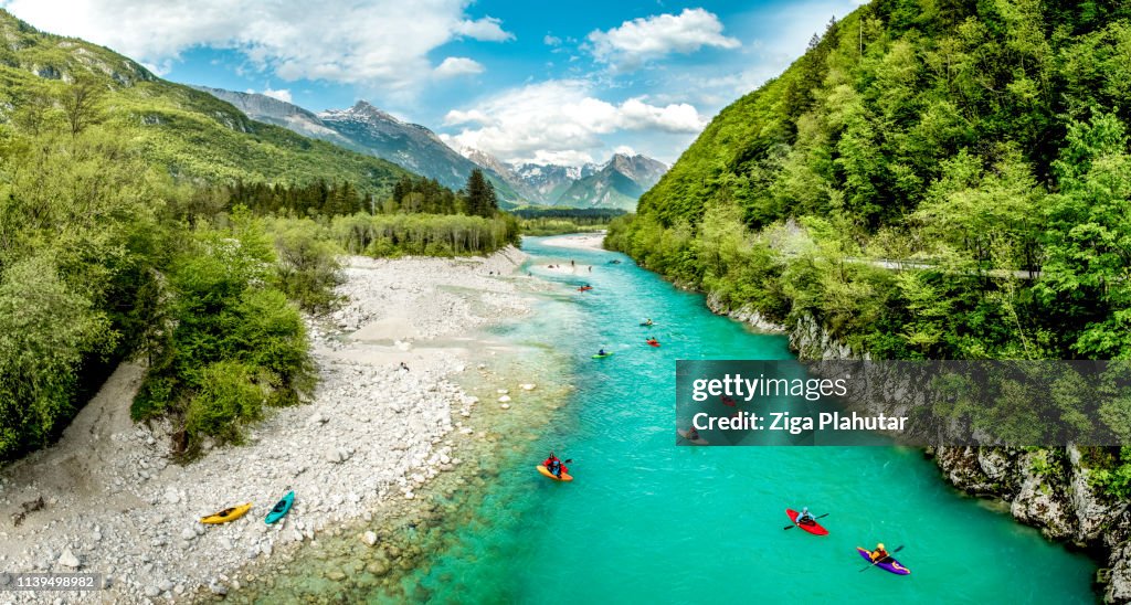 Group of people kayaking on the river Soča in Slovenia Europe