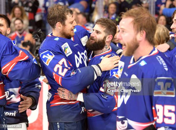 Brendan Mikkelson and Cody Lampl of the Adler Mannheim during the game between the Adler Mannheim and the EHC Red Bull Muenchen at the SAP Arena on...